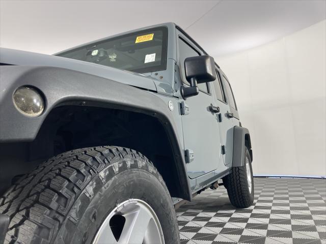 used 2015 Jeep Wrangler Unlimited car, priced at $18,291