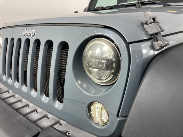 used 2015 Jeep Wrangler Unlimited car, priced at $18,291