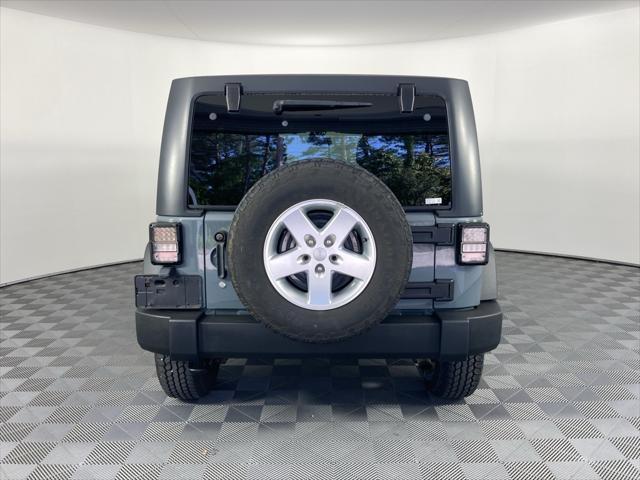 used 2015 Jeep Wrangler Unlimited car, priced at $18,291
