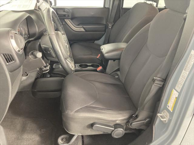 used 2015 Jeep Wrangler Unlimited car, priced at $18,291