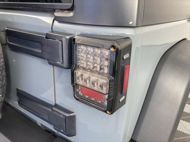 used 2015 Jeep Wrangler Unlimited car, priced at $18,291