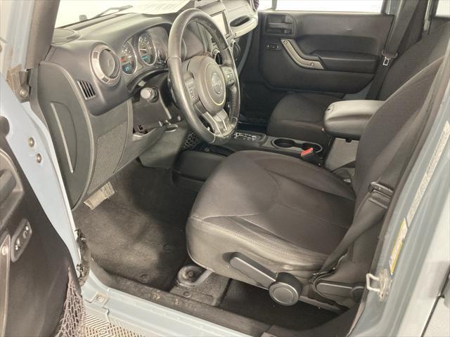 used 2015 Jeep Wrangler Unlimited car, priced at $18,291