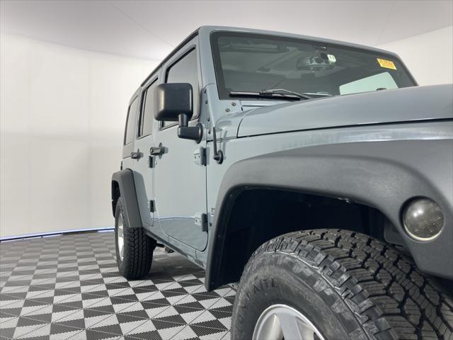 used 2015 Jeep Wrangler Unlimited car, priced at $18,291