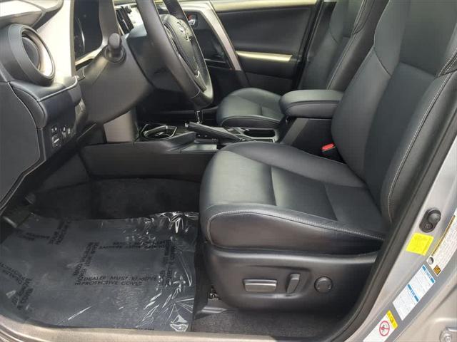 used 2018 Toyota RAV4 Hybrid car, priced at $23,000