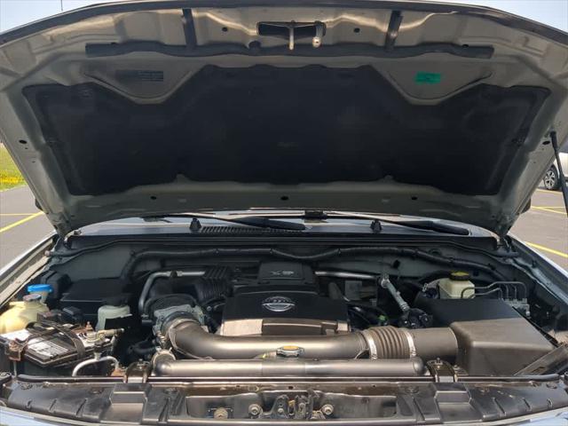 used 2014 Nissan Frontier car, priced at $15,000
