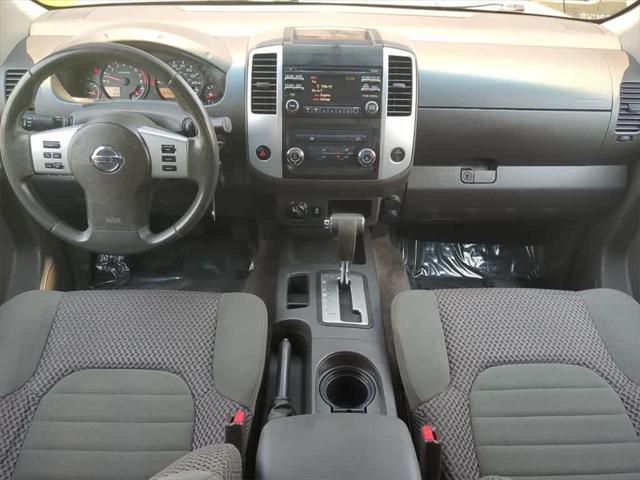 used 2014 Nissan Frontier car, priced at $15,000