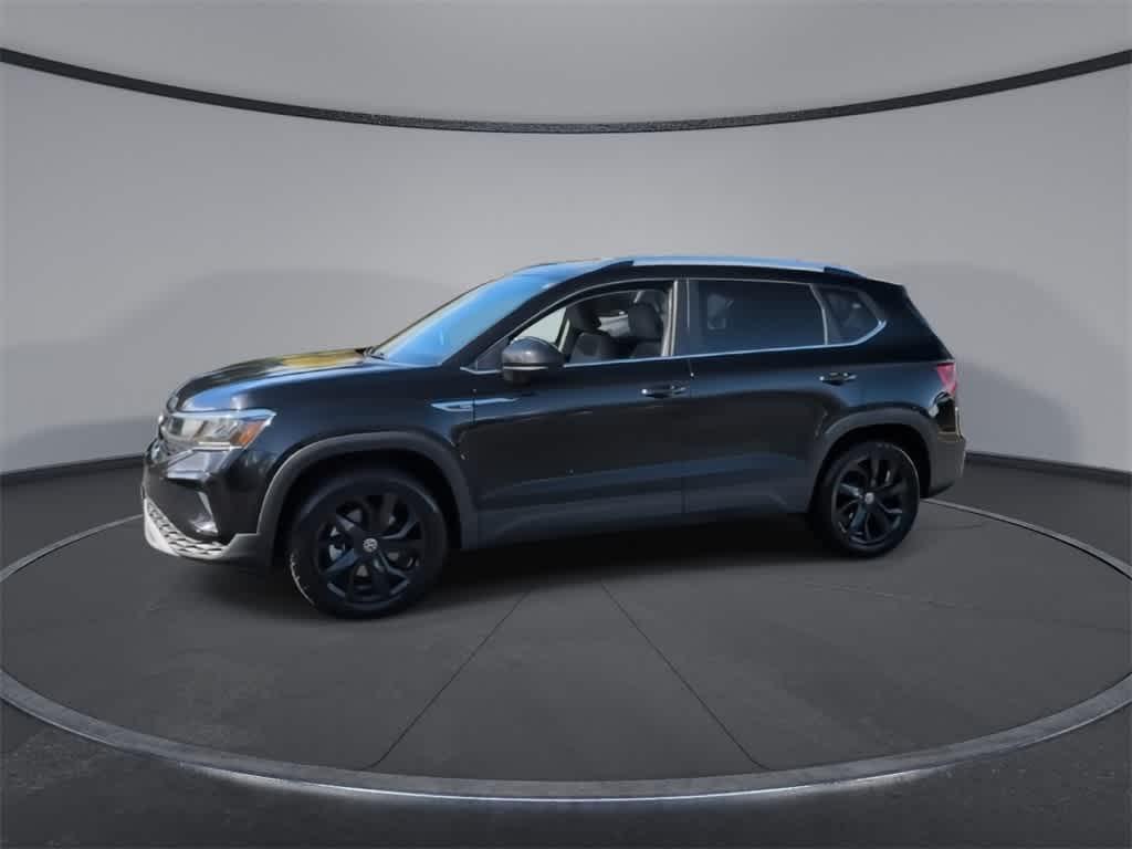 used 2023 Volkswagen Taos car, priced at $23,000