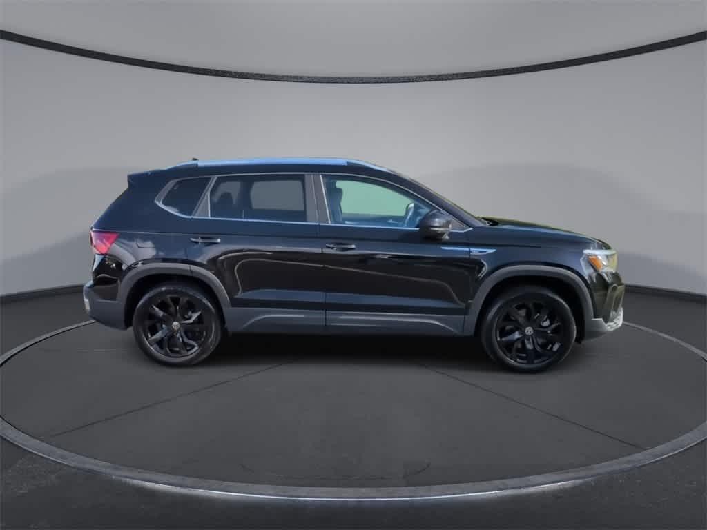 used 2023 Volkswagen Taos car, priced at $23,000