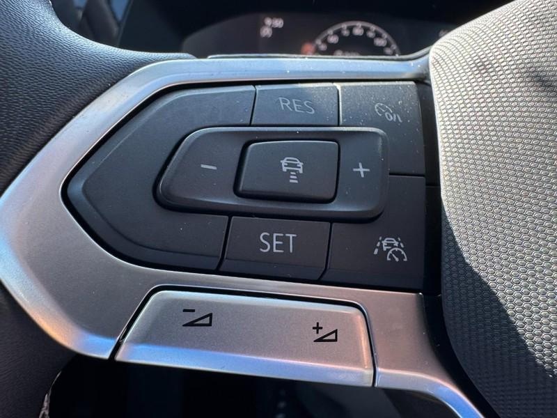 used 2023 Volkswagen Taos car, priced at $19,229