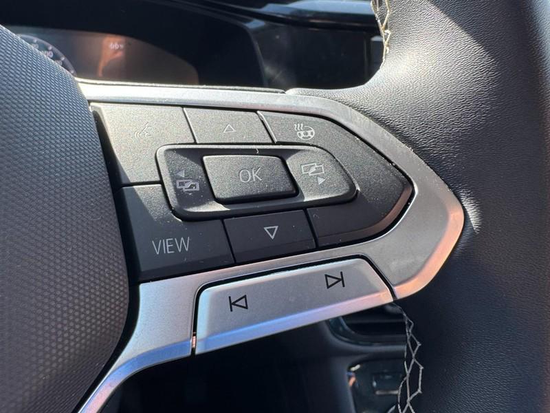 used 2023 Volkswagen Taos car, priced at $19,229
