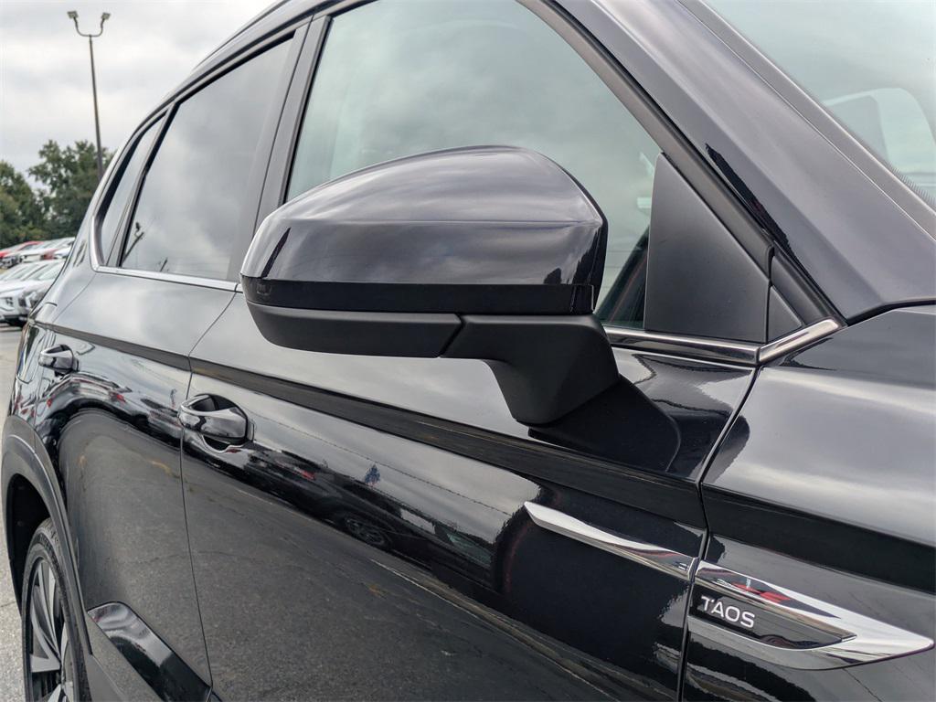 used 2024 Volkswagen Taos car, priced at $20,698