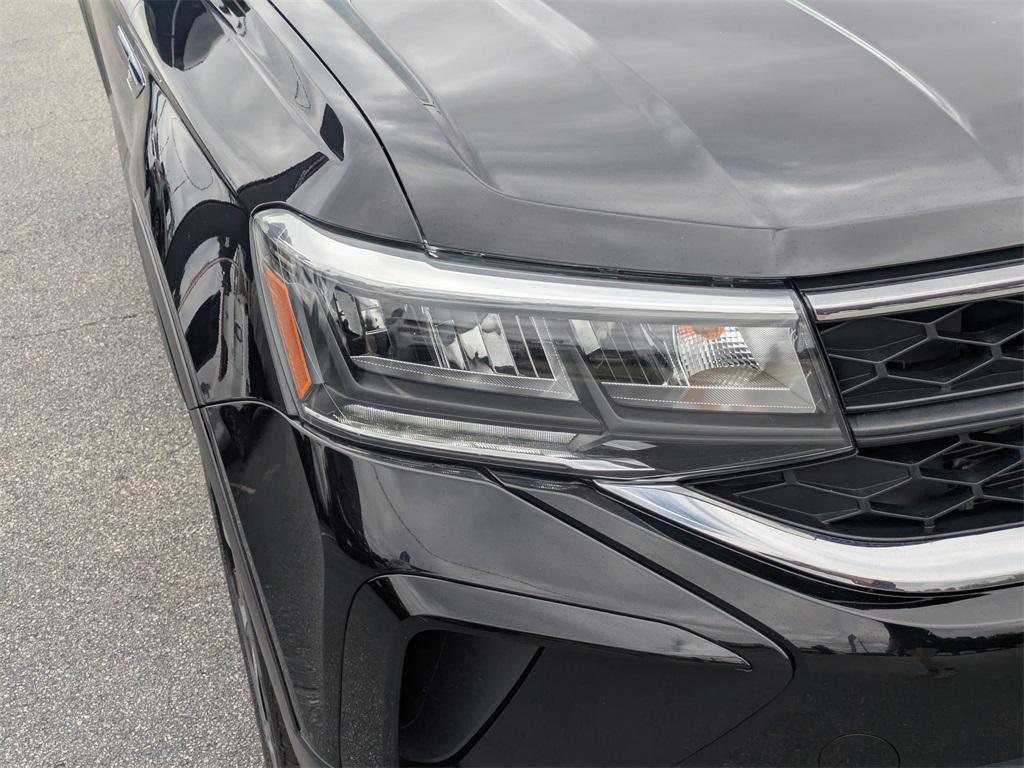 used 2024 Volkswagen Taos car, priced at $20,698