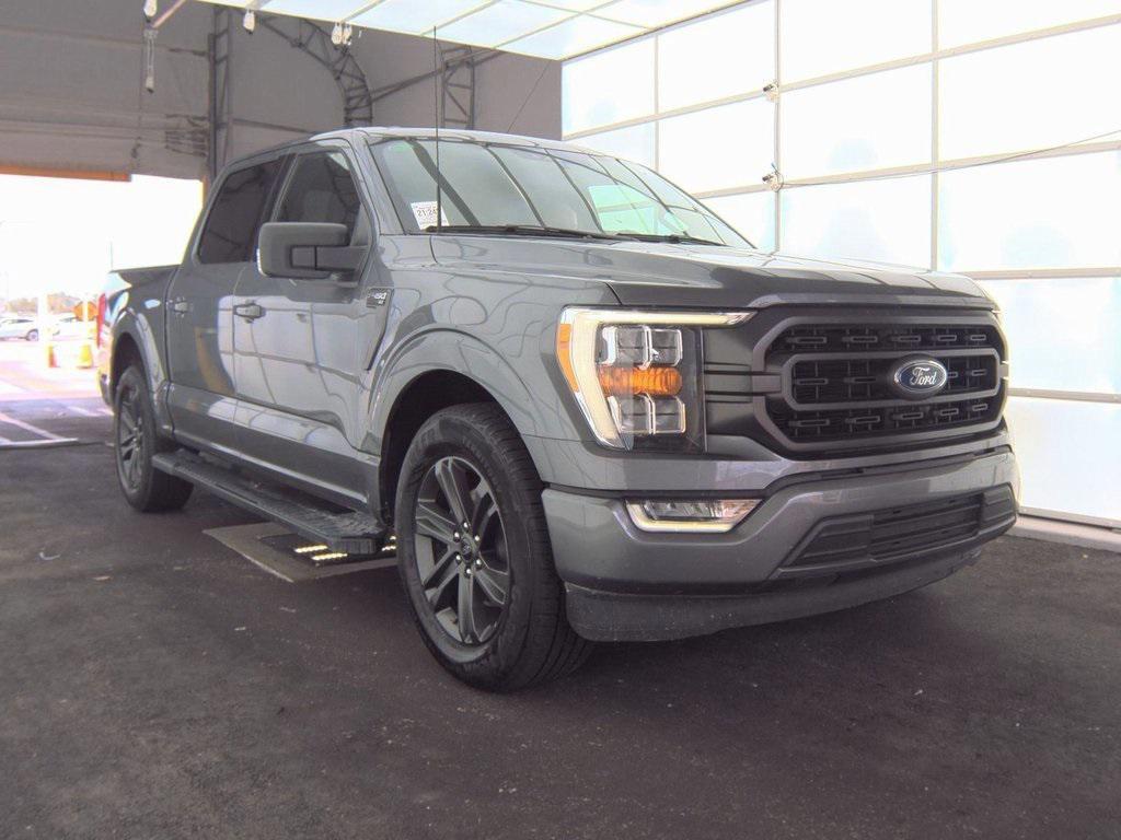 used 2023 Ford F-150 car, priced at $34,452