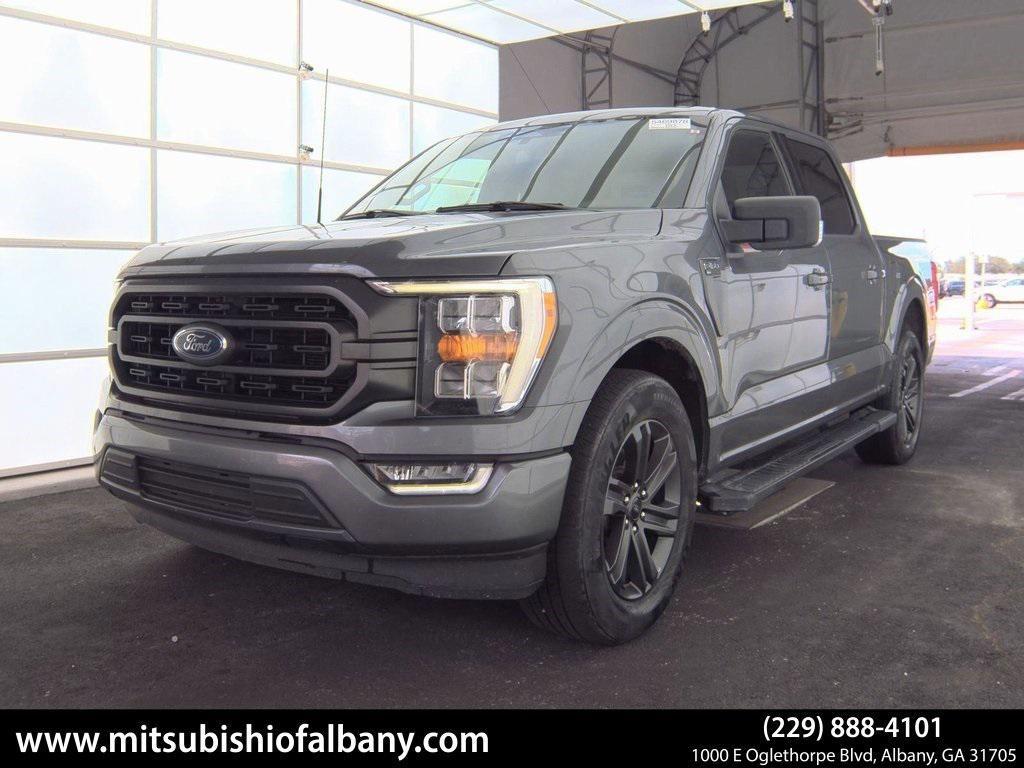 used 2023 Ford F-150 car, priced at $34,452