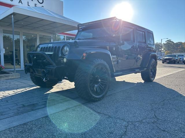 used 2015 Jeep Wrangler Unlimited car, priced at $19,999