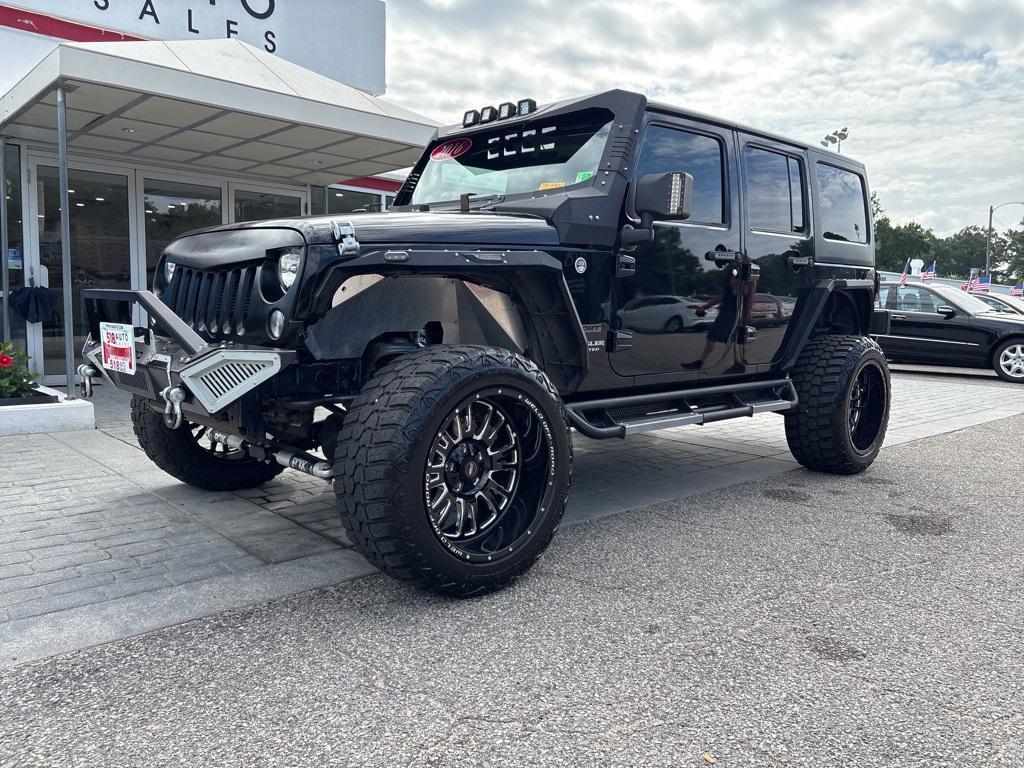 used 2016 Jeep Wrangler Unlimited car, priced at $16,999