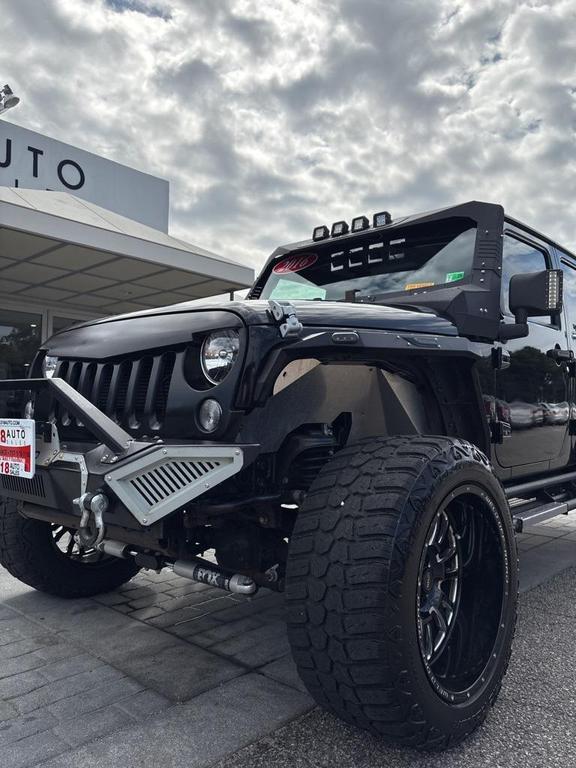 used 2016 Jeep Wrangler Unlimited car, priced at $16,999