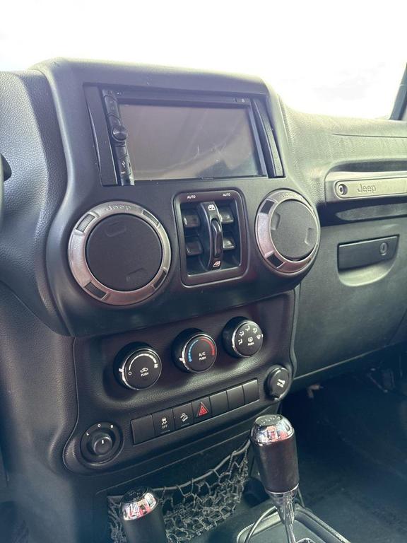 used 2016 Jeep Wrangler Unlimited car, priced at $16,999