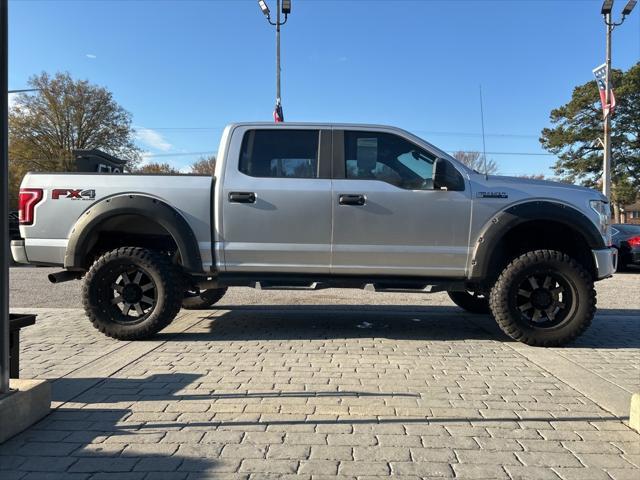 used 2015 Ford F-150 car, priced at $23,999