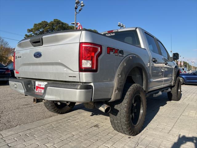 used 2015 Ford F-150 car, priced at $23,999