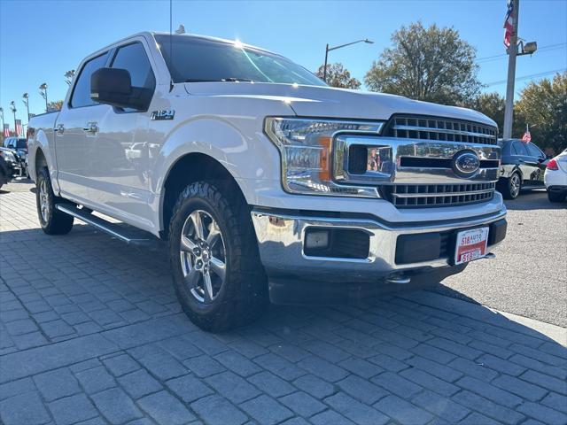 used 2018 Ford F-150 car, priced at $19,999