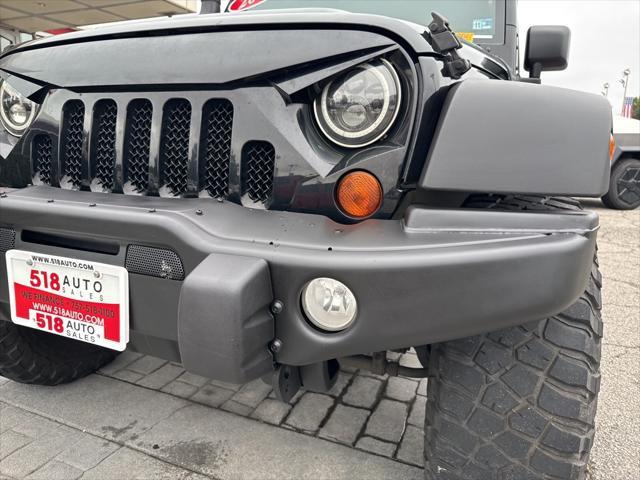 used 2012 Jeep Wrangler Unlimited car, priced at $14,999