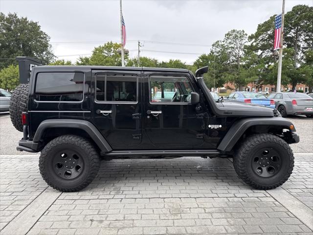 used 2012 Jeep Wrangler Unlimited car, priced at $14,999