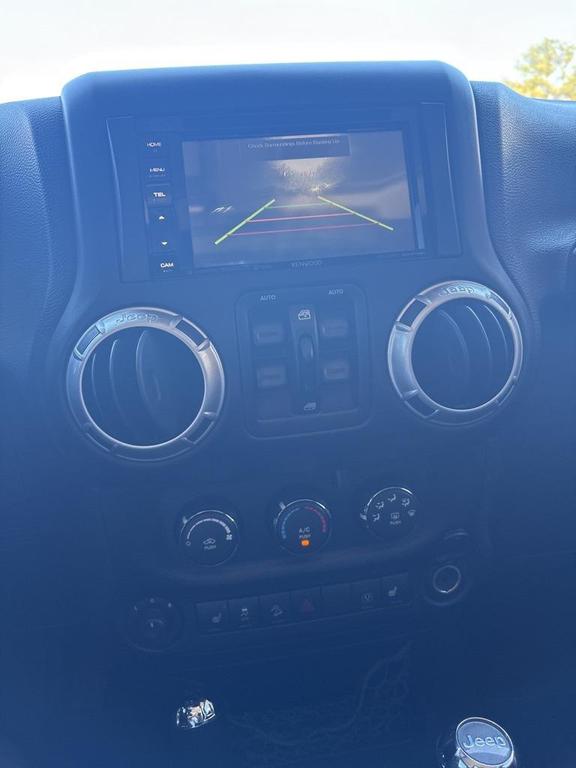 used 2015 Jeep Wrangler Unlimited car, priced at $23,500