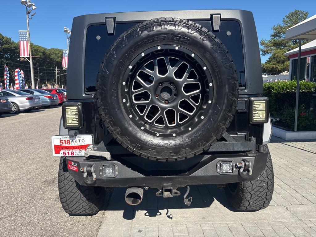 used 2015 Jeep Wrangler Unlimited car, priced at $23,500