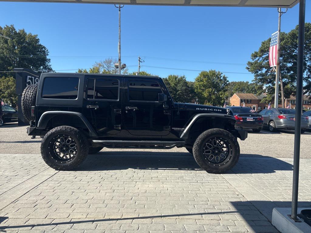 used 2015 Jeep Wrangler Unlimited car, priced at $23,500