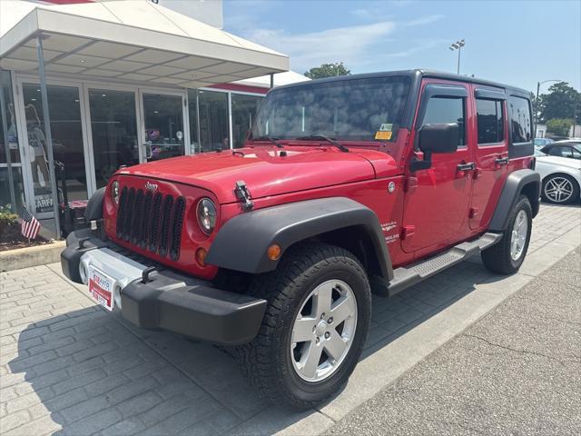 used 2012 Jeep Wrangler Unlimited car, priced at $16,999