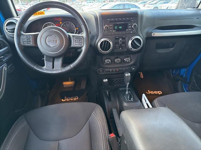 used 2015 Jeep Wrangler Unlimited car, priced at $13,999