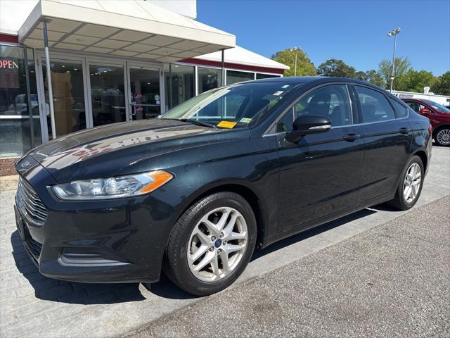 used 2014 Ford Fusion car, priced at $7,500