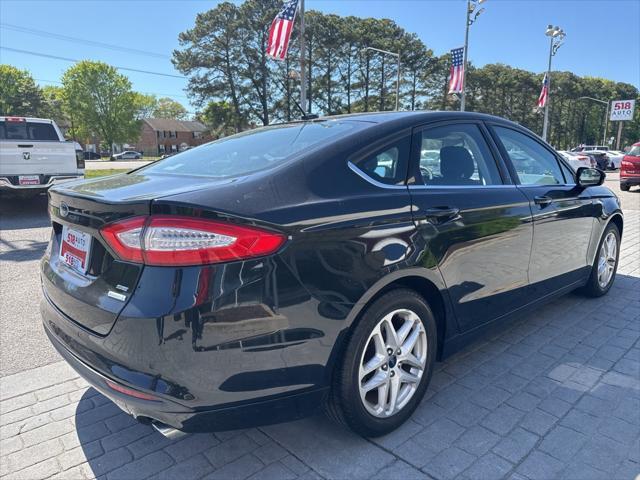 used 2014 Ford Fusion car, priced at $7,500