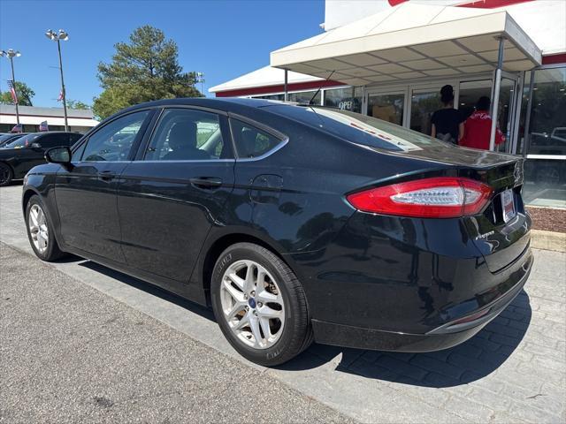 used 2014 Ford Fusion car, priced at $7,500