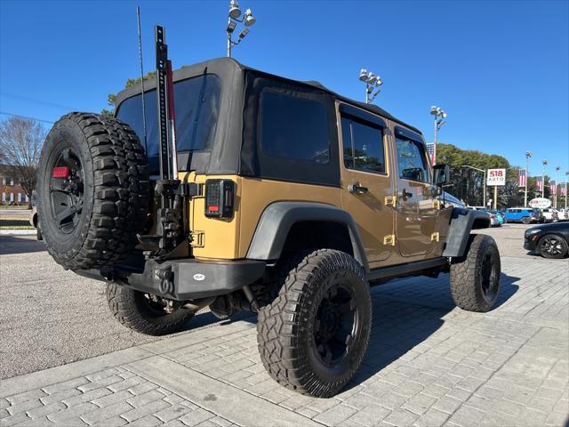 used 2013 Jeep Wrangler Unlimited car, priced at $16,500