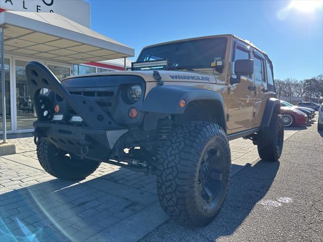 used 2013 Jeep Wrangler Unlimited car, priced at $16,500