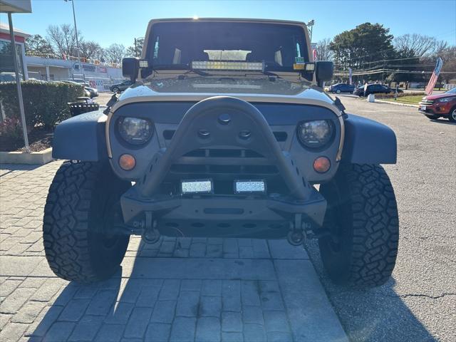 used 2013 Jeep Wrangler Unlimited car, priced at $16,500