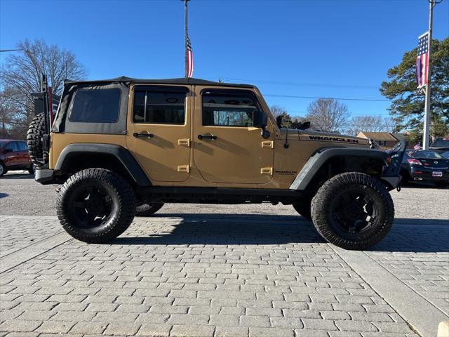 used 2013 Jeep Wrangler Unlimited car, priced at $16,500