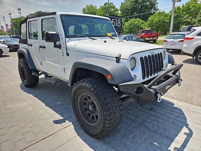 used 2015 Jeep Wrangler Unlimited car, priced at $16,999