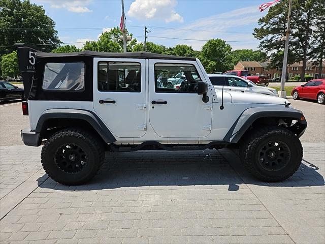 used 2015 Jeep Wrangler Unlimited car, priced at $16,999