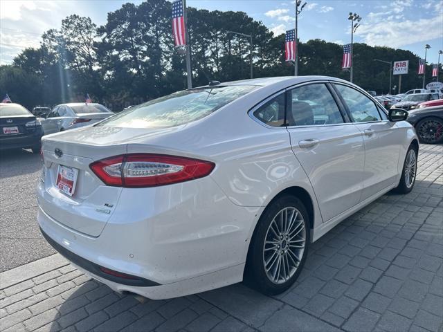 used 2014 Ford Fusion car, priced at $9,999