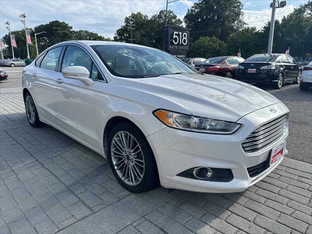 used 2014 Ford Fusion car, priced at $9,999