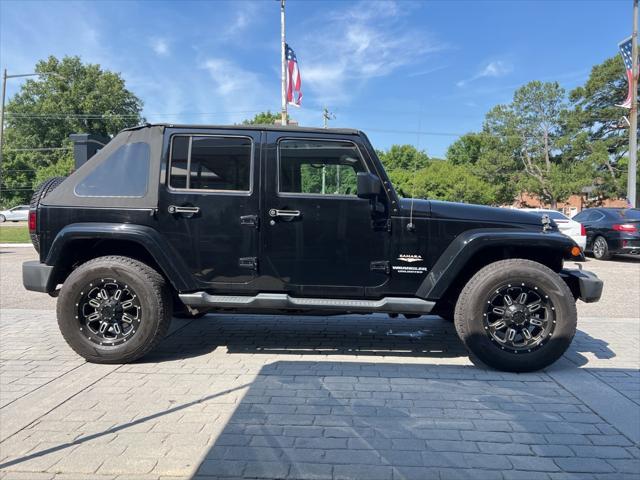 used 2014 Jeep Wrangler Unlimited car, priced at $13,500