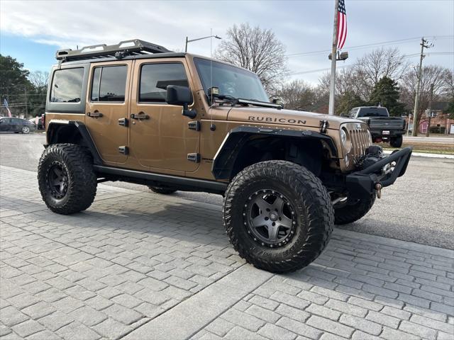 used 2015 Jeep Wrangler Unlimited car, priced at $16,999