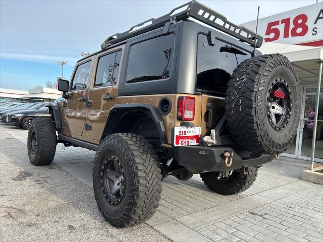 used 2015 Jeep Wrangler Unlimited car, priced at $16,999