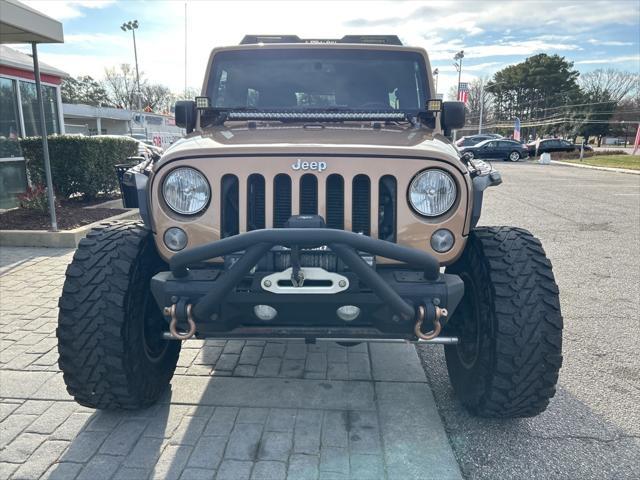 used 2015 Jeep Wrangler Unlimited car, priced at $16,999