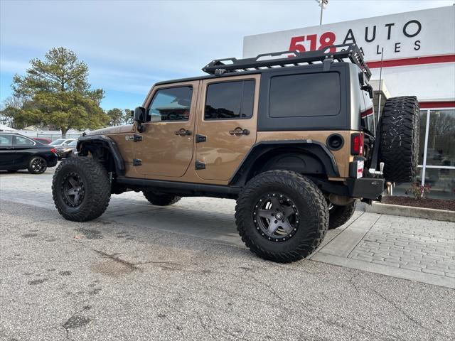 used 2015 Jeep Wrangler Unlimited car, priced at $16,999