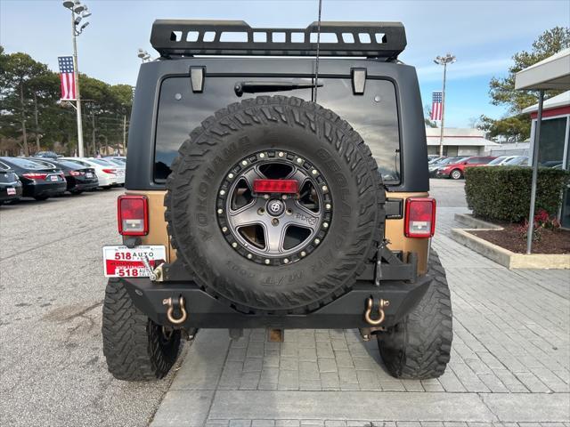 used 2015 Jeep Wrangler Unlimited car, priced at $16,999