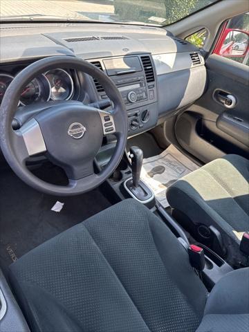 used 2011 Nissan Versa car, priced at $6,999